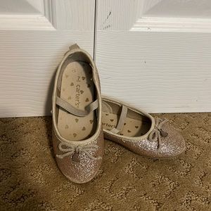 Carters size toddler 7 glitter ballet flats.  Color is a rose gold.